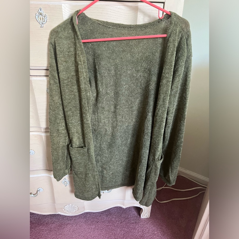 Green cardigan size small but can fit a medium